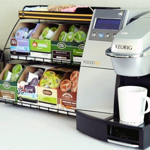 keurig coffee machine beside various keurig coffee pods